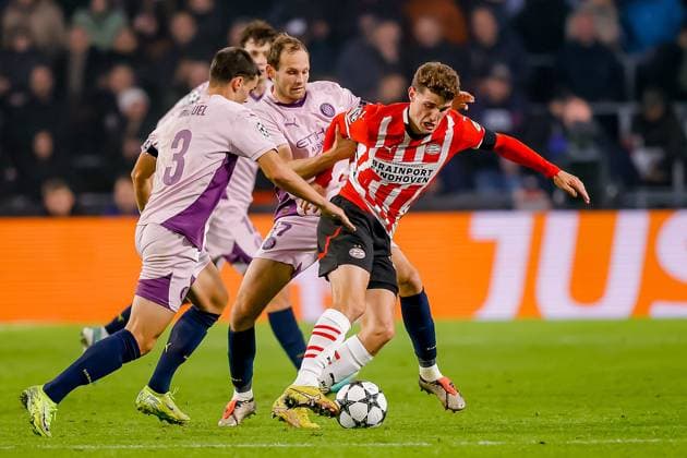 EINDHOVEN, 05-11-2024, Philips stadium. Dutch football. Champions League, season 2024 2025. Player PSV Guus Til vs player Girona Miguel GutiÅ½rrez PSV - Girona  x26676090x Copyright: