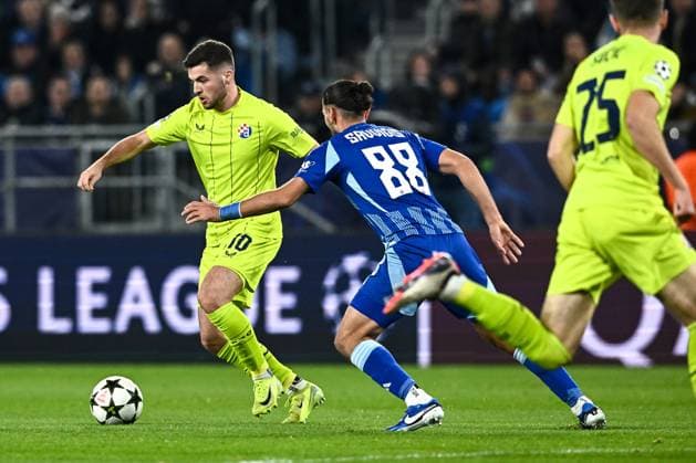 SK Slovan Bratislava v GNK Dinamo - UEFA Champions League 2024 25 League Phase MD4 Martin Baturina of Dinamo Zagreb and Kyriakos Savvidis of Slovan Bratislava in action during the UEFA Champions League 2024 25 League Phase MD4 match between SK Slovan Bratislava and GNK Dinamo at National football stadium on November 5, 2024 in Bratislava, Slovakia.  MarkoxLukunic PIXSELL