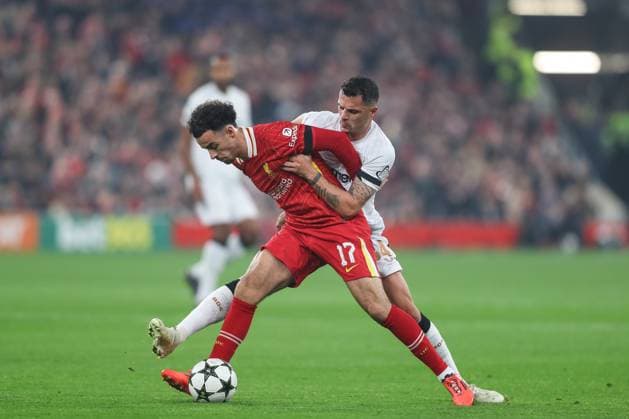 UEFA Champions League, League Stage Liverpool v Bayer 04 Leverkusen Curtis Jones of Liverpool holds off Granit Xhaka of Bayer Leverkusen during the UEFA Champions League, League Stage match Liverpool vs Bayer 04 Leverkusen at Anfield, Liverpool, United Kingdom, 5th November 2024 (Photo by Gareth Evans News Images) Liverpool Anfield Merseyside United Kingdom Copyright: xGarethxEvans NewsxImagesx