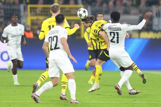SOCCER - UEFA CL, Dortmund vs Sturm DORTMUND,GERMANY,05.NOV.24 - SOCCER - UEFA Champions League, Borussia Dortmund vs SK Sturm Graz. Image shows Marcel Sabitzer (Dortmund) and Tochi Chukwuani (Sturm).  GEPAxpictures xChrisxBauer