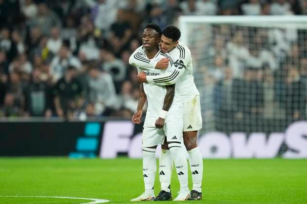 Real Madrid C.F. v AC Milan - UEFA Champions League 2024 25 League Phase MD4 Vinicius Junior left winger of Real Madrid and Brazil celebrates after scoring his sides first goal with Jude Bellingham central midfield of Real Madrid and England during the UEFA Champions League 2024 25 League Phase MD4 match between Real Madrid C.F. and AC Milan at Estadio Santiago Bernabeu on November 5, 2024 in Madrid, Spain. Madrid Spain  Copyright: xJosexBretonx originalFilename:bretonhernandez-realmadr241105_np6DT.jpg