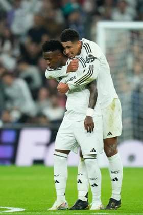 Real Madrid C.F. v AC Milan - UEFA Champions League 2024 25 League Phase MD4 Vinicius Junior left winger of Real Madrid and Brazil celebrates after scoring his sides first goal with Jude Bellingham central midfield of Real Madrid and England during the UEFA Champions League 2024 25 League Phase MD4 match between Real Madrid C.F. and AC Milan at Estadio Santiago Bernabeu on November 5, 2024 in Madrid, Spain. Madrid Spain  Copyright: xJosexBretonx originalFilename:bretonhernandez-realmadr241105_npMJQ.jpg