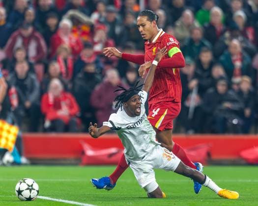 Liverpool v Bayer Leverkusen Champions League 05 11 2024. Liverpool defender Virgil van Dijk (4) tackles Bayer Leverkusen defender Jeremie Frimpong (30) during the Champions League match between Liverpool and Bayer Leverkusen at Anfield, Liverpool, England on 5 November 2024. Editorial use only , Copyright: xIanxStephenx PSI-20755-0010