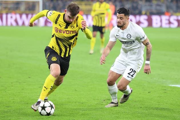 SOCCER - UEFA CL, Dortmund vs Sturm DORTMUND,GERMANY,05.NOV.24 - SOCCER - UEFA Champions League, Borussia Dortmund vs SK Sturm Graz. Image shows Pascal Gross (Dortmund) and Jusuf Gazibegovic (Sturm).  GEPAxpictures xChrisxBauer