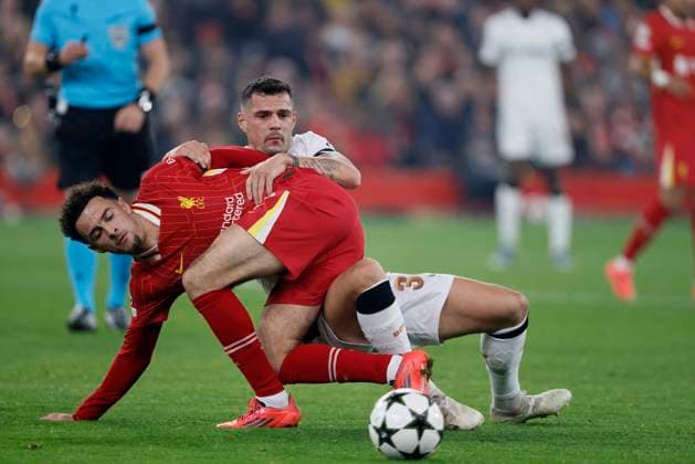 Sport Bilder des Tages Liverpool FC v Bayer 04 Leverkusen - UEFA Champions League 2024 25 League Phase MD4 Curtis Jones of Liverpool and Granit Xhaka of Bayer 04 Leverkusen challenge during the UEFA Champions League 2024 25 League Phase MD4 match between Liverpool FC and Bayer 04 Leverkusen at Anfield on November 5, 2024 in Liverpool, England. Liverpool Anfield England United Kingdom Copyright: xRichardxSellers Sportsphoto APLx 14051912