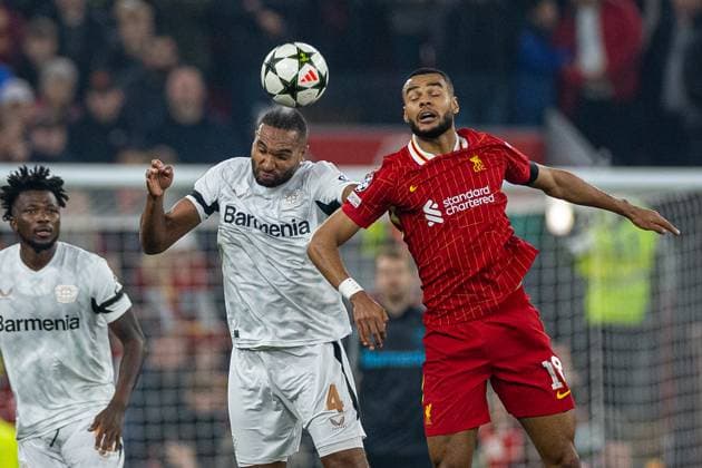 Football - UEFA Champions League - League Phase - Liverpool FC v Bologna FC 1909 LIVERPOOL, ENGLAND - Wednesday, October 2, 2024: Bayer Leverkusen s Jonathan Tah (L) challenges for a header with Liverpool s Cody Gakpo during the UEFA Champions League game between Liverpool FC and Bologna FC 1909 at Anfield. (Photo by David Rawcliffe Propaganda) LIVERPOOL Anfield MERSEYSIDE ENGLAND  Copyright: xDavidxRawcliffex P2024-11-05-Liverpool_Leverkusen-19