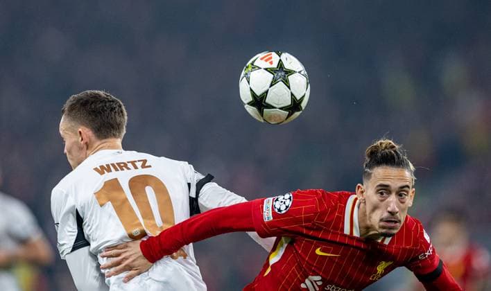 Football - UEFA Champions League - League Phase - Liverpool FC v Bologna FC 1909 LIVERPOOL, ENGLAND - Wednesday, October 2, 2024: Liverpool s Kostas Tsimikas (R) and Bayer Leverkusen s Florian Wirtz during the UEFA Champions League game between Liverpool FC and Bologna FC 1909 at Anfield. (Photo by David Rawcliffe Propaganda) LIVERPOOL Anfield MERSEYSIDE ENGLAND  Copyright: xDavidxRawcliffex P2024-11-05-Liverpool_Leverkusen-24
