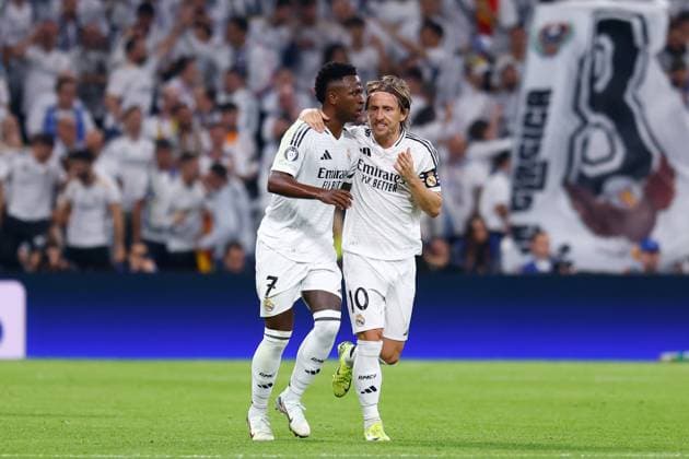 November 5, 2024, Madrid, Madrid, SPAIN: Vinicius Junior and Luka Modric of Real Madrid celebrate a goal during the UEFA Champions League 2024 25 League Phase MD4 match between Real Madrid CF and AC Milan at Estadio Santiago Bernabeu on November 5, 2024, in Madrid, Spain. Madrid SPAIN - ZUMAa181 20241105_zaa_a181_019 Copyright: xDennisxAgyemanx