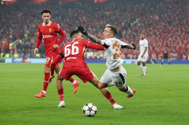 UEFA Champions League, League Stage Liverpool v Bayer 04 Leverkusen Trent Alexander-Arnold of Liverpool fouls Alex Grimaldo of Bayer Leverkusen during the UEFA Champions League, League Stage match Liverpool vs Bayer 04 Leverkusen at Anfield, Liverpool, United Kingdom, 5th November 2024 (Photo by Gareth Evans News Images) Liverpool Anfield Merseyside United Kingdom Copyright: xGarethxEvans NewsxImagesx