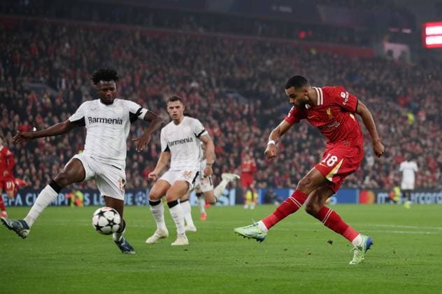 Liverpool, England, 5th November 2024. Cody Gapko of Liverpool fires in a shot during the UEFA Champions League match at Anfield, Liverpool. Picture credit should read: Jessica Hornby Sportimage EDITORIAL USE ONLY. No use with unauthorised audio, video, data, fixture lists, club league logos or live services. Online in-match use limited to 120 images, no video emulation. No use in betting, games or single club league player publications. SPI-3439-0048