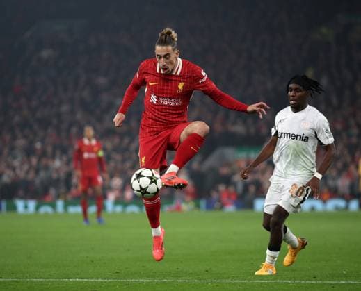Liverpool, England, 5th November 2024. Kostas Tsimikas of Liverpool during the UEFA Champions League match at Anfield, Liverpool. Picture credit should read: Jessica Hornby Sportimage EDITORIAL USE ONLY. No use with unauthorised audio, video, data, fixture lists, club league logos or live services. Online in-match use limited to 120 images, no video emulation. No use in betting, games or single club league player publications. SPI-3439-0049
