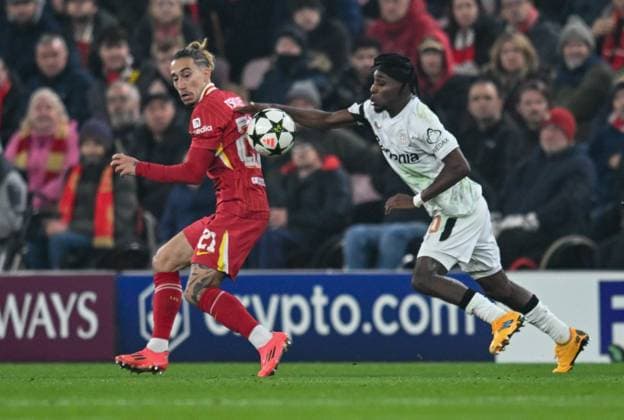 Liverpool v Bayer Leverkusen UEFA Champions League Alejandro Grimaldo of Bayern Leverkusen and Kostas Tsimikas of Liverpool during the UEFA Champions League match at Anfield, Liverpool UK Newspapers OUT Copyright: xKarlxVallantinex FIL-20882-0017
