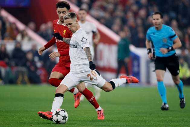 Liverpool FC v Bayer 04 Leverkusen - UEFA Champions League 2024 25 League Phase MD4 Alex Grimaldo of Bayer 04 Leverkusen shoots at goal during the UEFA Champions League 2024 25 League Phase MD4 match between Liverpool FC and Bayer 04 Leverkusen at Anfield on November 5, 2024 in Liverpool, England. Liverpool Anfield England United Kingdom Copyright: xRichardxSellers Sportsphoto APLx 14051915