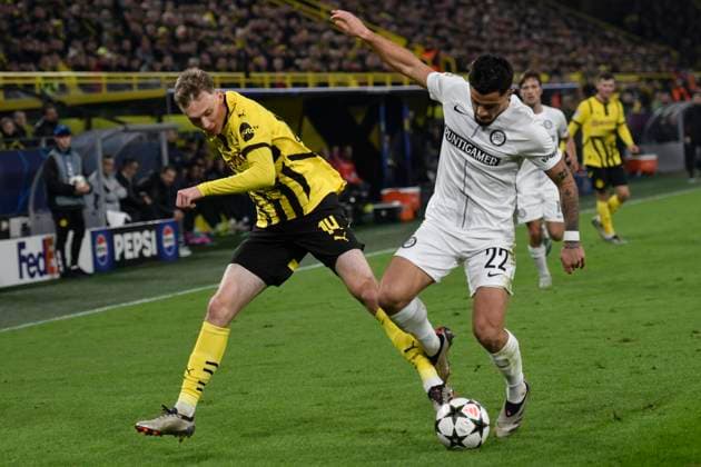from left in duel Maximilian Beier Dortmund 14 Jusuf Gazibegovic Graz 22 05 11 2024 Soccer, Champions League, Borussia Dortmund vs Sturm Graz, Signal Iduna Park, Dortmund, NRW Germany Copyright: xpepphotox xHorstxMauelshagenx pep00321, pep_20241105_hm_0425
