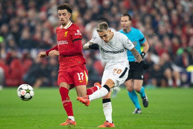 Liverpool v Bayer Leverkusen Champions League 05 11 2024. Liverpool midfielder Curtis Jones (17) battles with Bayer Leverkusen defender Alex Grimaldo (20) during the Champions League match between Liverpool and Bayer Leverkusen at Anfield, Liverpool, England on 5 November 2024. Editorial use only , Copyright: xIanxStephenx PSI-20755-0021