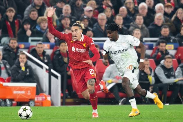 Liverpool v Bayer Leverkusen Champions League 05 11 2024. GOAL DISALLOWED OFF-SIDE Bayer Leverkusen defender Jeremie Frimpong (30) in an offside position, Liverpool defender Kostas Tsimikas (21) signals during the Champions League match between Liverpool and Bayer Leverkusen at Anfield, Liverpool, England on 5 November 2024. Editorial use only , Copyright: xIanxStephenx PSI-20755-0022
