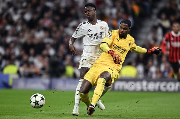 Db Madrid 05 11 2024 - Champions League Real Madrid-Milan foto Daniele Buffa Image nella foto: Mike Maignan-Vinicius Junior 