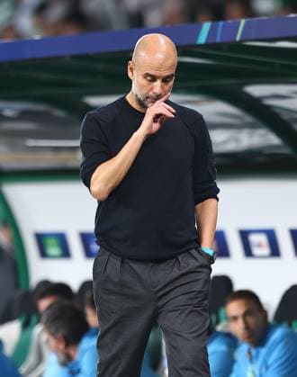 Josep Guardiola manager of Manchester City reacts Sporting Lisbon v Manchester City, UEFA Champions League, Group Stage, Football, Estadio Jose Alvalade, Lisbon, Portugal - 05 Nov 2024 EDITORIAL USE ONLY No use with unauthorised audio, video, data, fixture lists, club league logos or live services. Online in-match use limited to 120 images, no video emulation. No use in betting, games or single club league player publications. Copyright: xMichaelxZemanek Shutterstockx 14863776ap