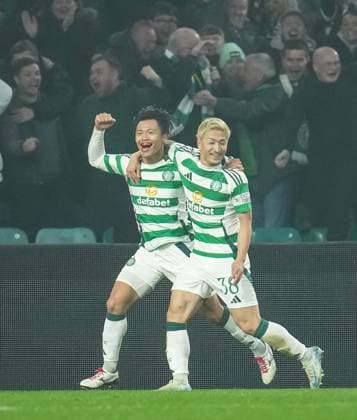 Reo Hatate of Celtic celebrates with Daizen Maeda of Celtic after scoring to give Celtic a 3-1 lead. Celtic v RB Leipzig, UEFA Champions League, Group Stage, Football, Celtic Park, Glasgow, Scotland, UK - 05 Nov 2024 EDITORIAL USE ONLY No use with unauthorised audio, video, data, fixture lists, club league logos or live services. Online in-match use limited to 120 images, no video emulation. No use in betting, games or single club league player publications. Copyright: xStuartxWallace Shutterstockx 14863772be