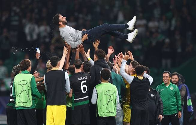 Ruben Amorim manager of Sporting Lisbon is thrown in the air by his players after the match Sporting Lisbon v Manchester City, UEFA Champions League, Group Stage, Football, Estadio Jose Alvalade, Lisbon, Portugal - 05 Nov 2024 EDITORIAL USE ONLY No use with unauthorised audio, video, data, fixture lists, club league logos or live services. Online in-match use limited to 120 images, no video emulation. No use in betting, games or single club league player publications.  Copyright: xMichaelxZemanek Shutterstockx 14863776bk
