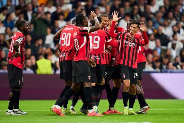Tijjani Reijnders of AC Milan celebrates with is teammates after scoring the 1-3 Real Madrid v AC Milan, UEFA Champios League match, date 4. Football, Santiago Bernabeu Stadium, Madrid, Spain - 5 Nov 2024 Editorial use only  Copyright: xPressinphoto Shutterstockx 14869602bf