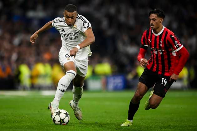 Real Madrid CF v AC Milan - UEFA Champions League Kylian Mbappe of Real Madrid CF is challenged by Tijjani Reijnders of AC Milan during the UEFA Champions League 2024 25 league phase football match between Real Madrid CF and AC Milan. Madrid Spain Copyright: xNicolòxCampox
