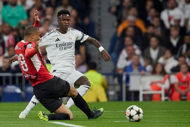 November 5, 2024, Madrid, Madrid, Spain: Vinicius Jr of Real Madrid CF and Malick Thiaw of AC Milan during the UEFA Champions League football match between Real Madrid CF and AC Milan at Santiago Bernabeu Stadium in Madrid, Spain, November 5, 2024 Madrid Spain - ZUMAa206 20241105_zsp_a206_033 Copyright: xRubenxAlbarranx