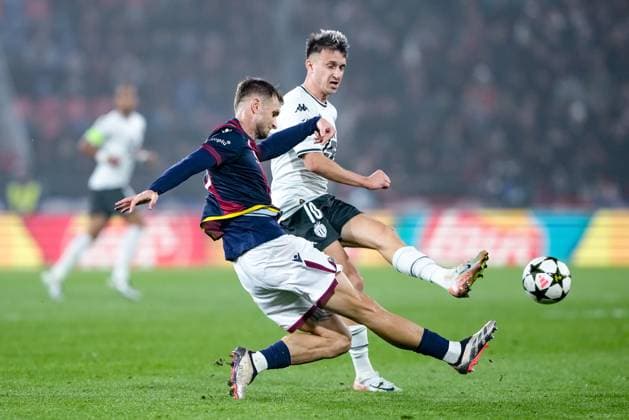 Bologna FC v AS Monaco - UEFA Champions League 2024 25 Stefan Posch of Bologna FC and Aleksandr Golovin of AS Monaco compete for the ball during the UEFA Champions League 2024 25 League Phase MD4 match between Bologna FC and AS Monaco at Stadio Renato Dall™Ara on November 05, 2024 in Bologna, Italy. Bologna Stadio Renato Dall ARA Bologna Italy Copyright: xGiuseppexMaffiax UCL_Bologna-Monaco_051124_DSC3170