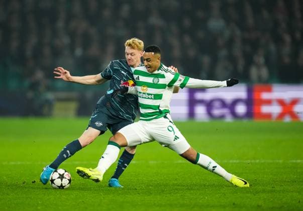 Adam Idah of Celtic dispossesses Nicolas Seiwald of RB Leipzig. Celtic v RB Leipzig, UEFA Champions League, Group Stage, Football, Celtic Park, Glasgow, Scotland, UK - 05 Nov 2024 EDITORIAL USE ONLY No use with unauthorised audio, video, data, fixture lists, club league logos or live services. Online in-match use limited to 120 images, no video emulation. No use in betting, games or single club league player publications. Copyright: xStuartxWallace Shutterstockx 14863772cp