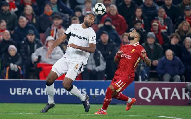 Liverpool FC v Bayer 04 Leverkusen - UEFA Champions League 2024 25 League Phase MD4 Jonathan Tah of Bayer 04 Leverkusen and Mohamed Salah of Liverpool challenge during the UEFA Champions League 2024 25 League Phase MD4 match between Liverpool FC and Bayer 04 Leverkusen at Anfield on November 5, 2024 in Liverpool, England. Liverpool Anfield England United Kingdom Copyright: xRichardxSellers Sportsphoto APLx 14051942