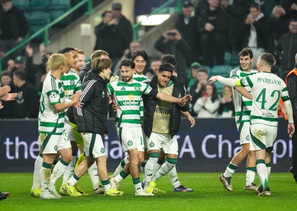 Player of the match Nicolas Kuhn of Celtic is pushed by team mates to celebrate in front of the Green Brigade Celtic fans at full-time after scoring twice in Celtic s 3-1 victory over RB Leipzig. Celtic v RB Leipzig, UEFA Champions League, Group Stage, Football, Celtic Park, Glasgow, Scotland, UK - 05 Nov 2024 EDITORIAL USE ONLY No use with unauthorised audio, video, data, fixture lists, club league logos or live services. Online in-match use limited to 120 images, no video emulation. No use in betting, games or single club league player publications. Copyright: xStuartxWallace Shutterstockx 14863772cu