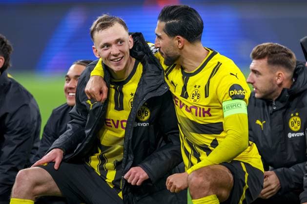 05 11 2024, Football, UEFA Champions League, Borussia Dortmund SK Sturm Graz, Matchday 4, Signal Iduna Park, Season 2024 2025 Final celebration after BVBs 1-0 win Maximilian Beier BVB 14 and Emre Can BVB 23 arm in arm together on the pitch North Rhine-Westphalia Germany