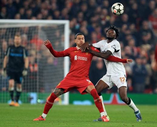 5th November 2024; Anfield, Liverpool, Merseyside, England; Champions League Football, Liverpool versus Bayer Leverkusen; Luis Diaz of Liverpool competes for the ball with Edmond Tapsoba of Bayer Leverkeusen  ActionPlus12712502 DavidxBlunsden