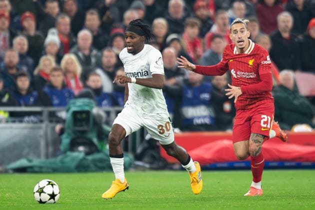 Liverpool v Bayer Leverkusen Champions League 05 11 2024. GOAL DISALLOWED OFF-SIDE Bayer Leverkusen defender Jeremie Frimpong (30) in an offside position, Liverpool defender Kostas Tsimikas (21) signals during the Champions League match between Liverpool and Bayer Leverkusen at Anfield, Liverpool, England on 5 November 2024. Editorial use only , Copyright: xIanxStephenx PSI-20755-0044