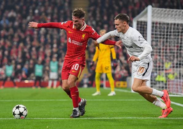 Liverpool v Bayer Leverkusen UEFA Champions League Alexis Mac Allister of Liverpool and Florian Wirtz of Bayern Leverkusen during the UEFA Champions League match at Anfield, Liverpool UK Newspapers OUT Copyright: xKarlxVallantinex FIL-20882-0067