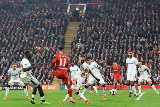 5th November 2024; Anfield, Liverpool, Merseyside, England; Champions League Football, Liverpool versus Bayer Leverkusen; Mohammed Salah of Liverpool shots st goal  ActionPlus12712529 DavidxBlunsden