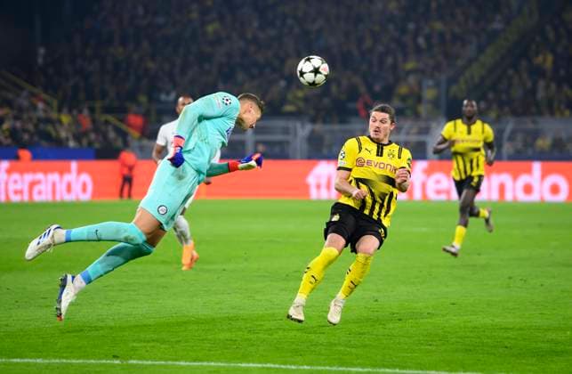 v l Goalkeeper Kjell SCHERPEN Graz , Marcel SABITZER DO Action, duel, Football Champions League, Matchday 4, Borussia Dortmund DO Sturm Graz 1 0, on 05 11 2024 in Dortmund Germany UEFA regulations prohibit any use of photographs as image sequences and or quasi video Â