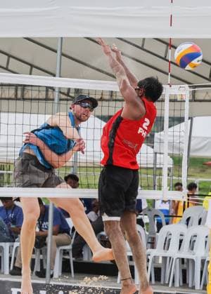 (241106) -- LAGUNA PROVINCE, Nov. 6, 2024 -- Thomas Hartles (L) of New Zealand competes against James Buytrago of the Philippines during the men s pool F match between Alani Nicklin Thomas Hartles of New Zealand and Alnakran Abdilla James Buytrago of the Philippines at the Asian Volleyball Confederation (AVC) 2024 Asian Senior Beach volleyball, Beachvolleyball Championships in Laguna Province, the Philippines, on Nov. 6, 2024. ) (SP)PHILIPPINES-LAGUNA PROVINCE-AVC 2024 ASIAN SENIOR BEACH VOLLEYBALL CHAMPIONSHIPS RouellexUmali 