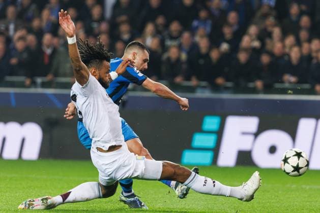 Aston Villa s Tyrone Mings and Club s Ferran Jutgla fight for the ball during a soccer game between Belgian Club Brugge KV and English Aston Villa F.C., Wednesday 06 November 2024 in Brugge, on the fourth day of the UEFA Champions League league phase. KURTxDESPLENTER  x104737580x