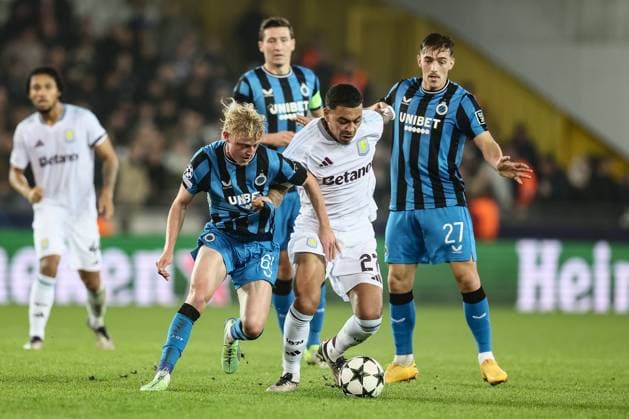 Club s Joaquin Seys and Aston Villa s Morgan Rogers fight for the ball during a soccer game between Belgian Club Brugge KV and English Aston Villa F.C., Wednesday 06 November 2024 in Brugge, on the fourth day of the UEFA Champions League league phase. BRUNOxFAHY  x104737917x