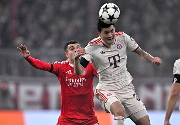 06 11 2024, Football UEFA Championsleague 2024 2025 Matchday 4, FC Bayern Munich Benfica Lisbon, at Allianz Arena Munich v l Zeki Amdouni Benfica Lisbon v Minjae Kim Bayern Munich DFL and DFB regulations prohibit any use of photographs as image sequences and or quasi video
