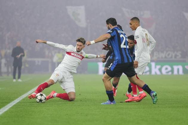 06 11 2024, Germany, Stuttgart, Football Champions League, VfB Stuttgart vs Atalanta Bergamo, v l Atakan Karazor VfB Sead Kolasinac Bergamo Enzo Millot VfB In accordance with the regulations of the DFL German Football League, it is prohibited to use or have used photographs taken in the stadium and or of the match in the form of sequential images and or video-like photo series