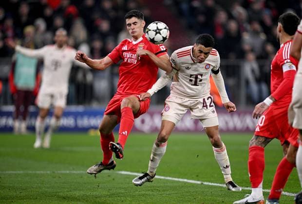 FOOTBALL CHAMPIONS LEAGUE SEASON 2024 2025 Preliminary Round 4 Matchday FC Bayern Muenchen Benfica Lisbon 06 11 2024 GOAL for 1 0 by scorer Jamal Musiala right, FC Bayern Muenchen against Antonio Silva left, Benfica Lisbon