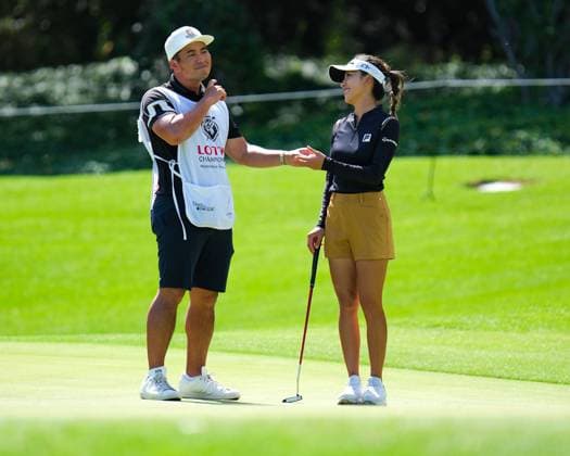 November 6, 2024: Muni He jokes with her caddie on the 13th hole green during the first round of the 2024 Lotte Championship presented by Hoakalei at Hoakalei Country Club in Ewa Beach, Hawaii. CSM Ewa Beach USA - ZUMAc04_ 20241106_zma_c04_236 Copyright: xGlennxYozax