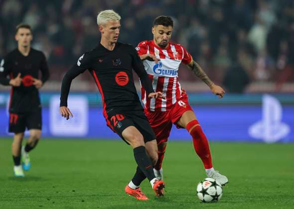 Crvena Zvezda v FC Barcelona, Barca - UEFA Champions League Dani Olmo (L) of Barcelona in action against Rade Krunic (R) of Crvena Zvezda during the UEFA Champions League match Season 2024 2025 match between Crvena Zvezda and FC Barcelona at stadium Rajko Mitic on November 06, 2024 in Belgrade, Serbia. Beograd Serbia Copyright: xSrdjanxStevanovicx x