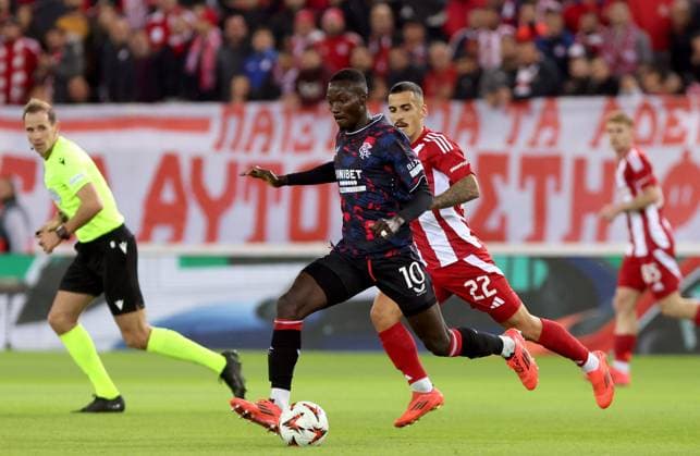 Mohammed Diomande of Rangers and Chiquinho of Olympiakos Olympiakos v Rangers, UEFA Europa League, Group Stage, Football, Georgios Karaiskakis Stadium, Pireas, Greece - 07 Nov 2024 EDITORIAL USE ONLY No use with unauthorised audio, video, data, fixture lists, club league logos or live services. Online in-match use limited to 120 images, no video emulation. No use in betting, games or single club league player publications. Copyright: xCostasxBaltas Shutterstockx 14878028v