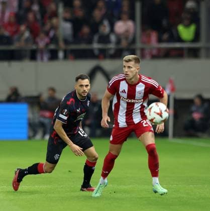 Costinha of Olympiacos and Nedim Bajrami of Rangers during the Europa League group phase match at the Stadio Georgios Karaiskakis, Athens. Olympiakos v Rangers, UEFA Europa League, Group Stage, Football, Georgios Karaiskakis Stadium, Pireas, Greece - 07 Nov 2024 EDITORIAL USE ONLY No use with unauthorised audio, video, data, fixture lists, club league logos or live services. Online in-match use limited to 120 images, no video emulation. No use in betting, games or single club league player publications. Copyright: xLukexNickerson RangersxFC Shutterstockx 14878765cy