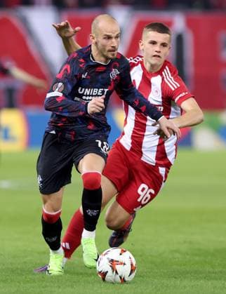 Vaclav Cerny of Rangers and Christos Mouzakitis of Olympiakos Olympiakos v Rangers, UEFA Europa League, Group Stage, Football, Georgios Karaiskakis Stadium, Pireas, Greece - 07 Nov 2024 EDITORIAL USE ONLY No use with unauthorised audio, video, data, fixture lists, club league logos or live services. Online in-match use limited to 120 images, no video emulation. No use in betting, games or single club league player publications. Copyright: xCostasxBaltas Shutterstockx 14878028ae