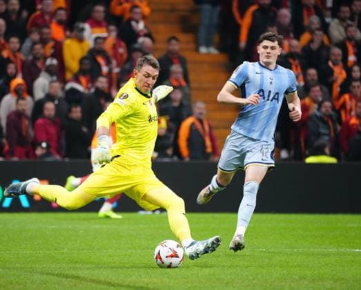 Galatasaray s goalkeeper Fernando Muslera and Totteham Hospur s player Will Lankshear during Galatasaray - Tottenham Hotspur UEFA Europe League match at Rams Stadium in Istanbul, Turkey, on 7 November 2024. ( Copyright: DepoxPhotos 18501240