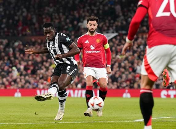 Manchester, England, 7th November 2024. PAOK s Mady Camara fires in a shot during the UEFA Europa League match at Old Trafford, Manchester. Picture credit should read: Andrew Yates Sportimage EDITORIAL USE ONLY. No use with unauthorised audio, video, data, fixture lists, club league logos or live services. Online in-match use limited to 120 images, no video emulation. No use in betting, games or single club league player publications. SPI-3442-0016